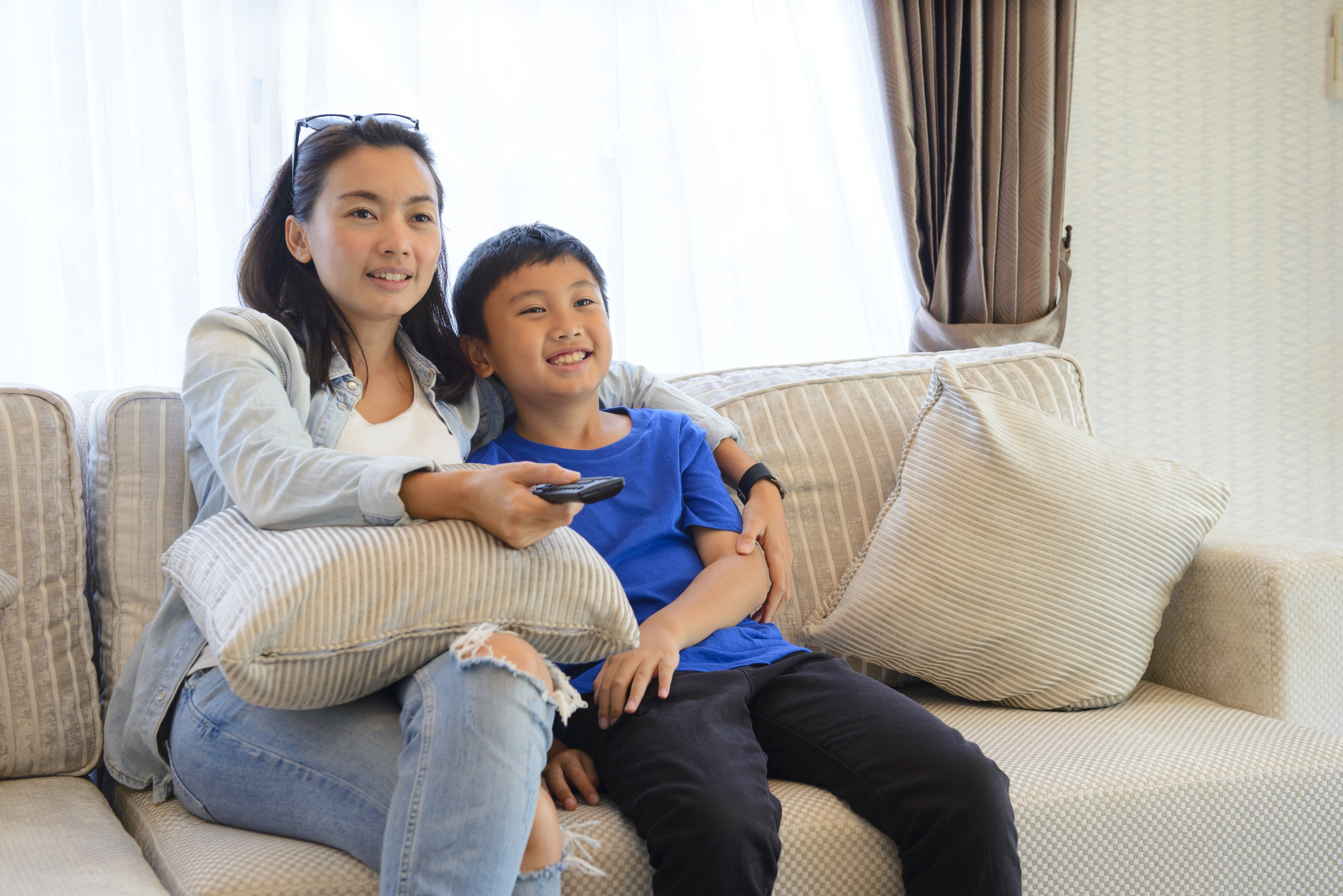 Asian Family Watching TV