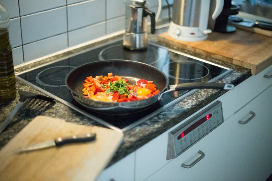 Image of vegetables cooking on a stovetop