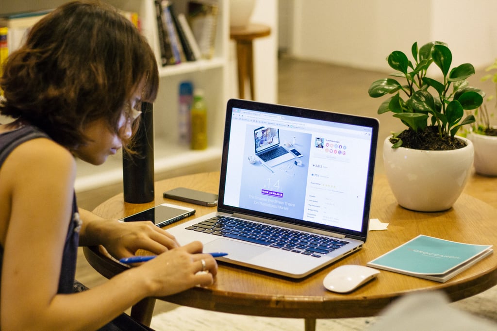 Image of a woman on a laptop