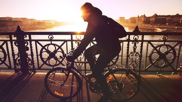 An image of a man on a bike