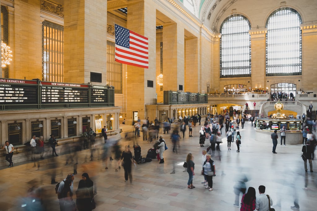 Image of business travelers passing through Grand Central Station
