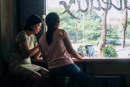 Image of women communicating in business