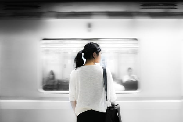 Image of a woman at the subway station