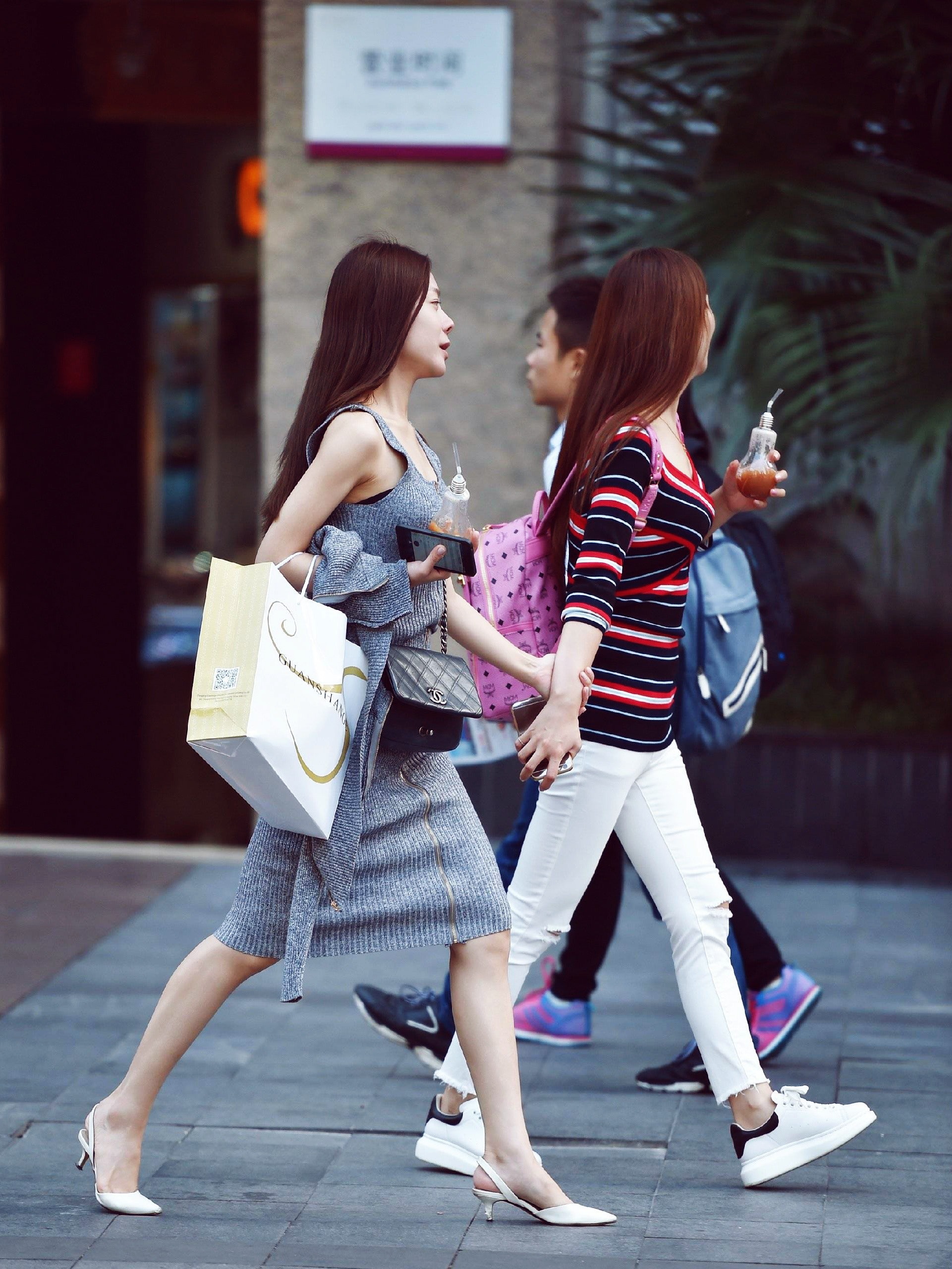 Image of women walking in Beijing