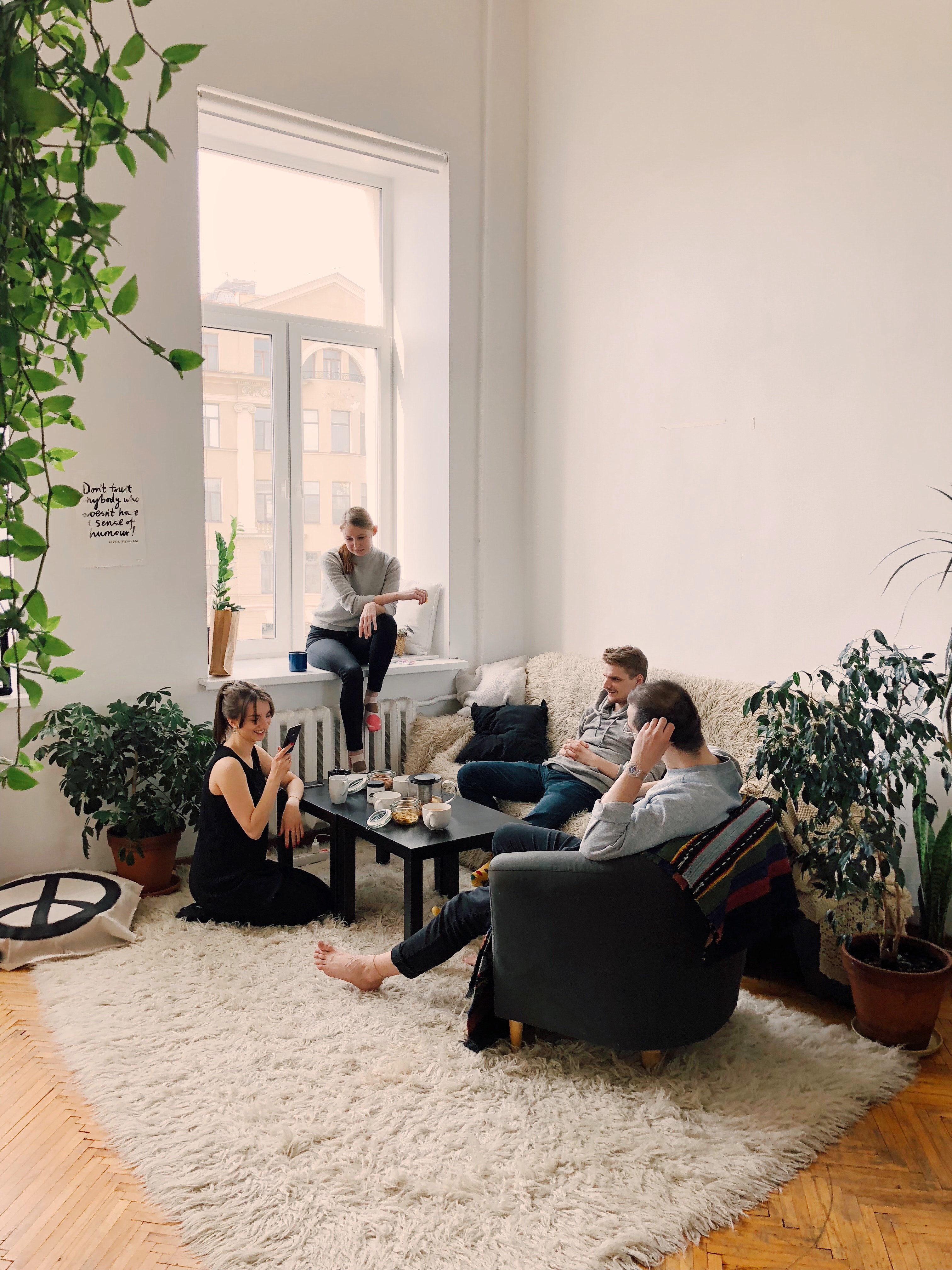 A photo of friends in an apartment 