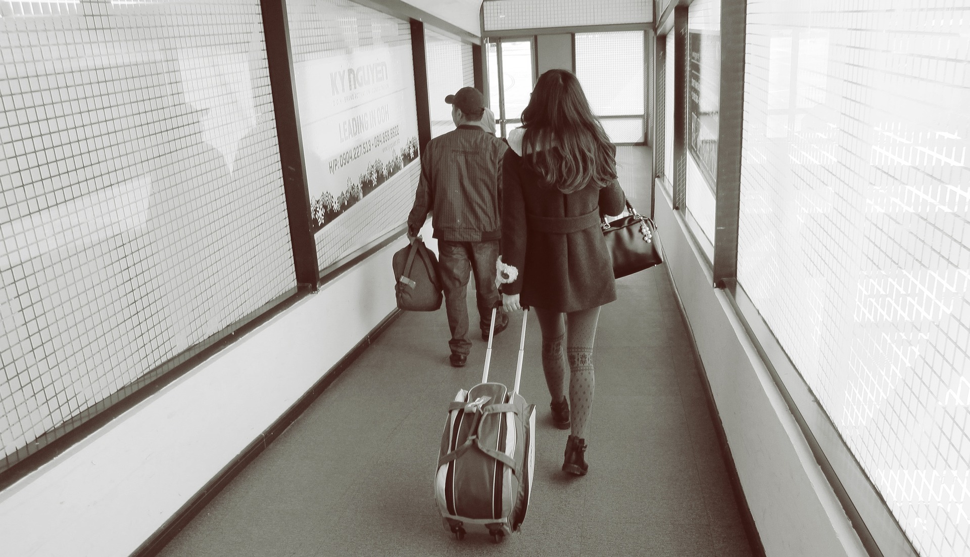 Image of people boarding an international flight