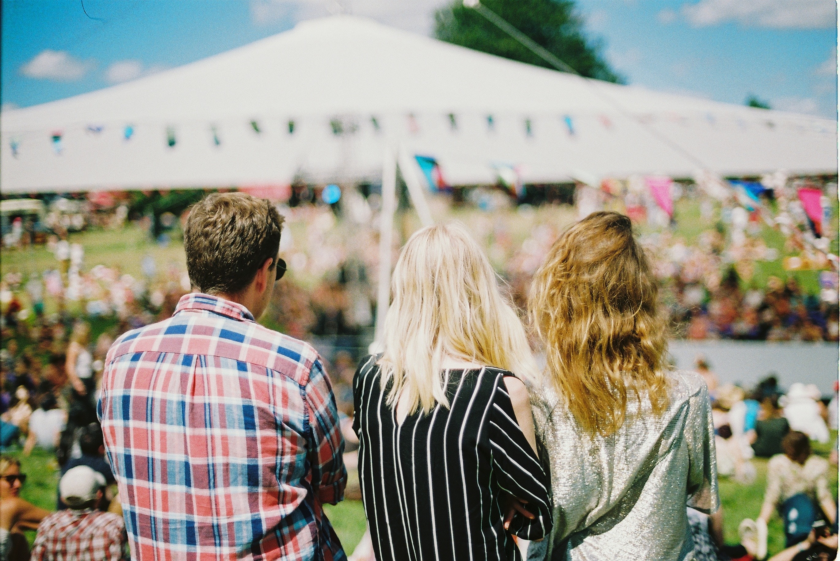 Image of friends at a festival