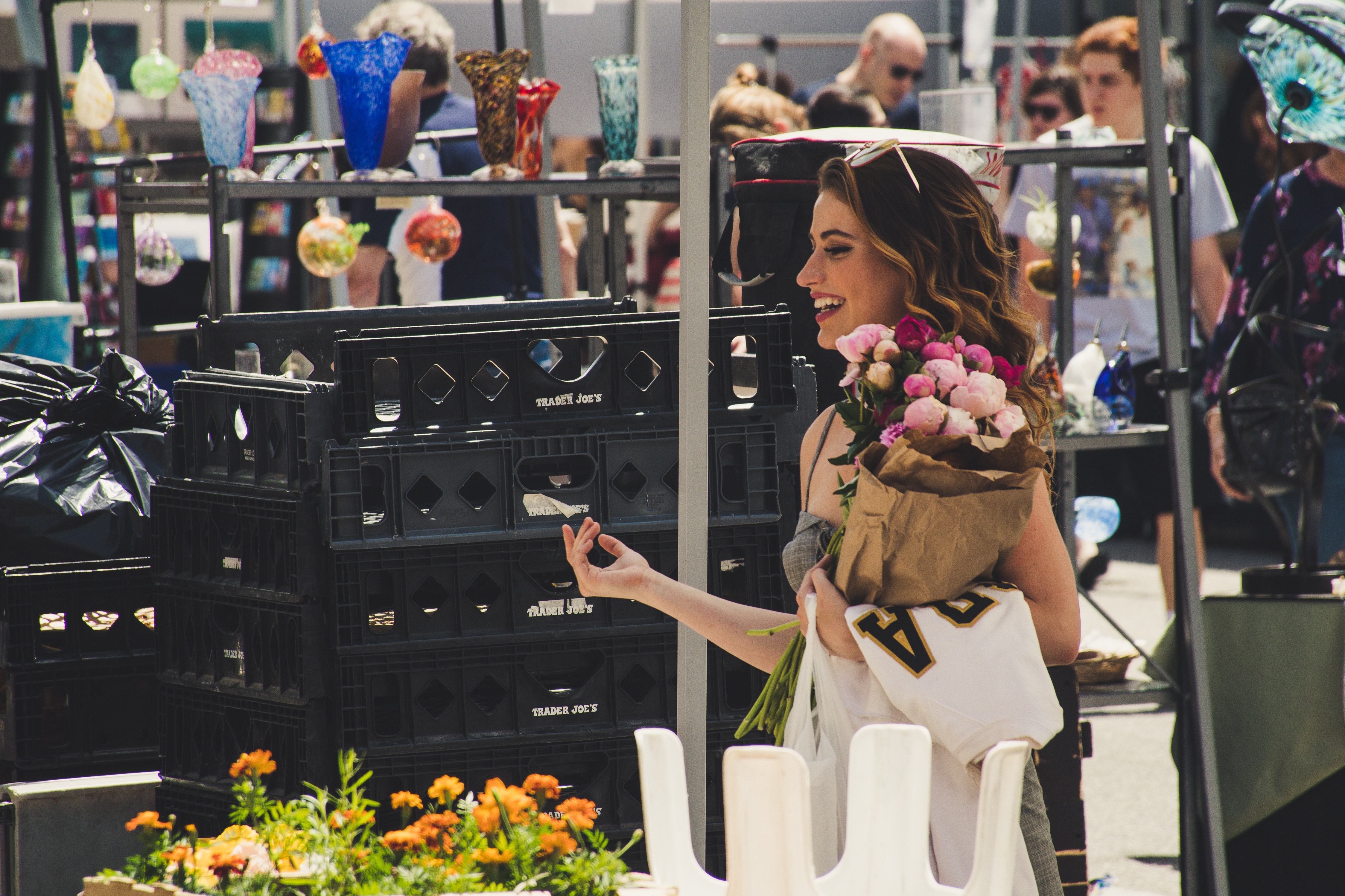 Image of a woman shopping at a flea market