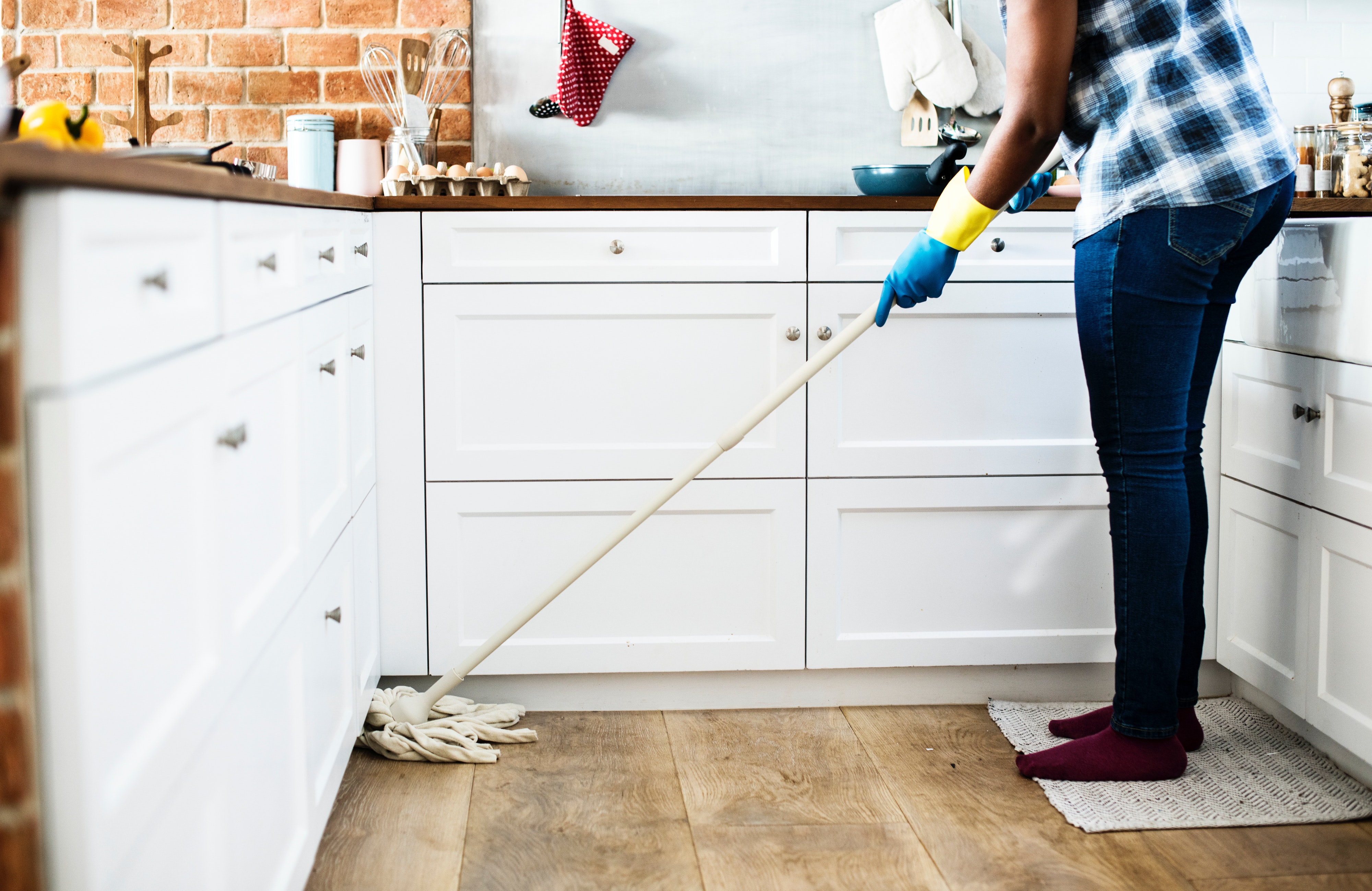 Image of a renter cleaning their home