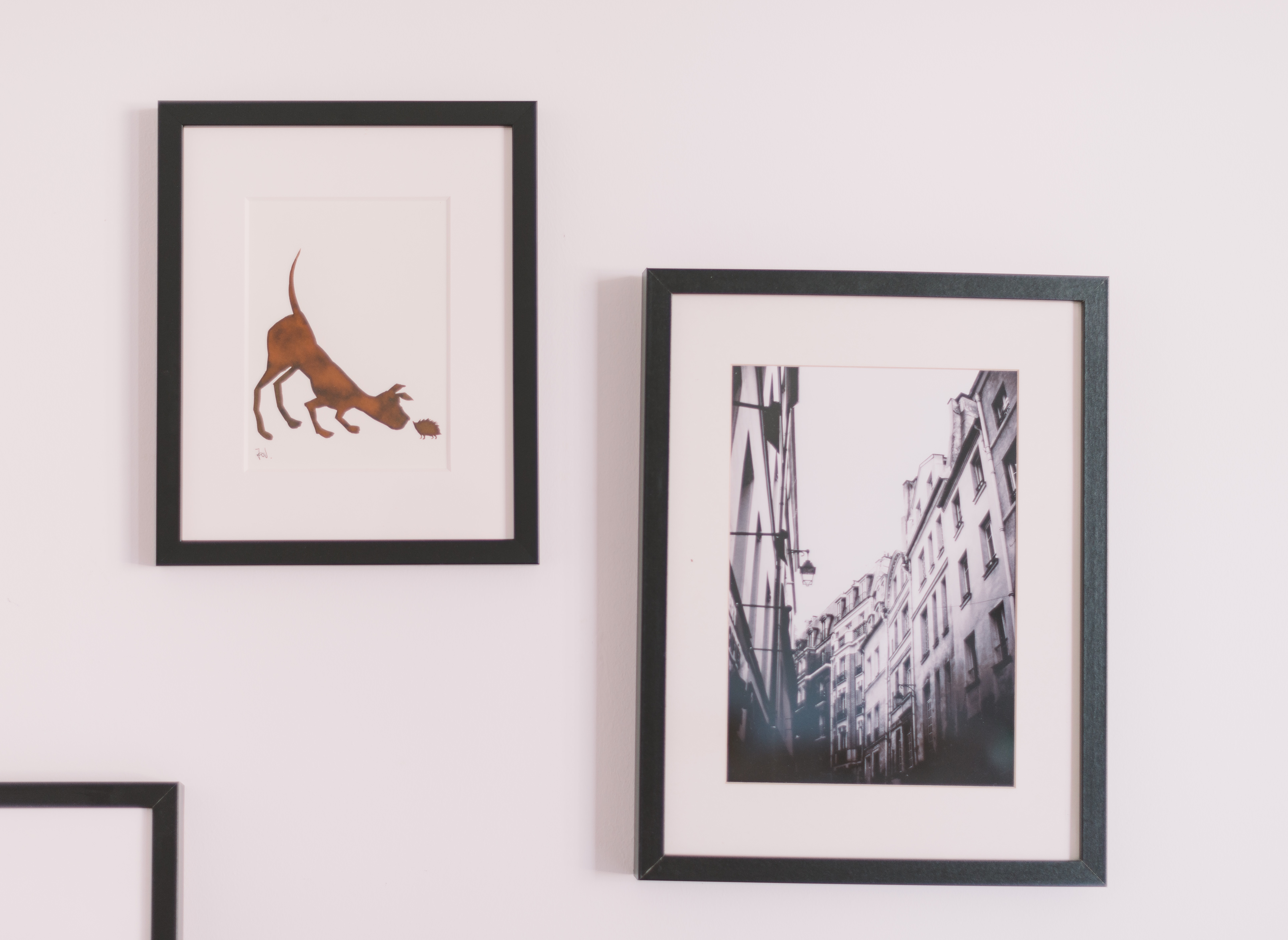 Image of framed art on an apartment wall