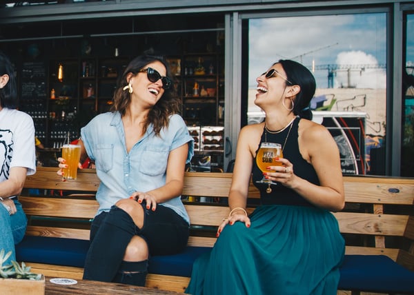 Image of two women laughing